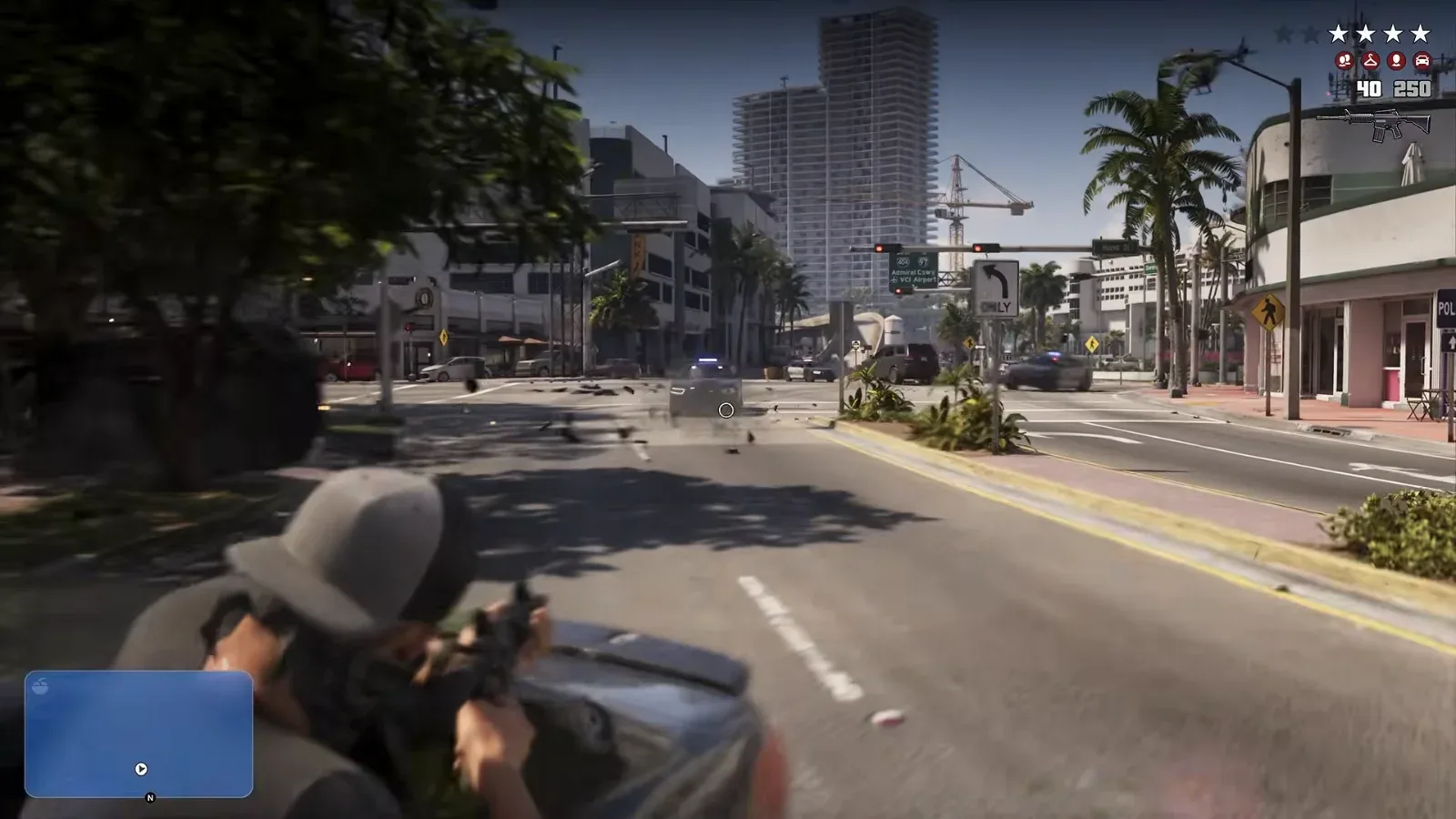 GTA 6 Extended Look: Jason fires a rifle over a car hood at police cars on a Vice City street, four wanted stars and 40 and 250 on the HUD