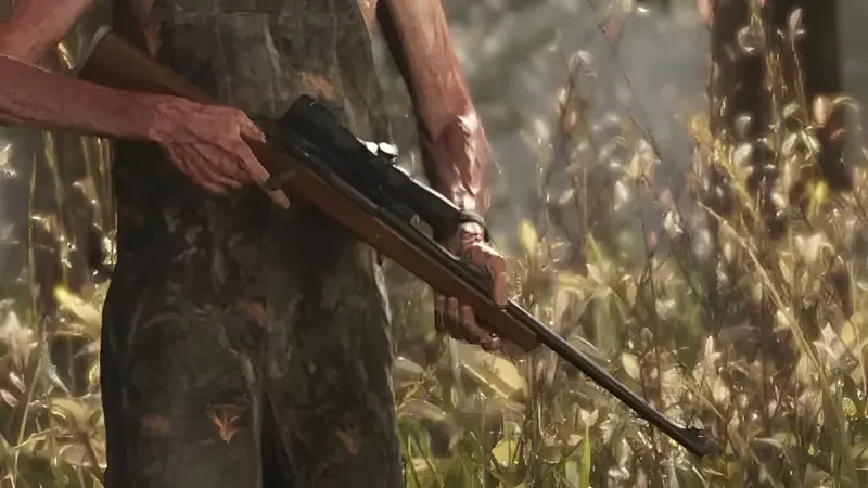 Hunter in camouflage holding a scoped bolt-action rifle in tall grass, from an official GTA 6 screenshot
