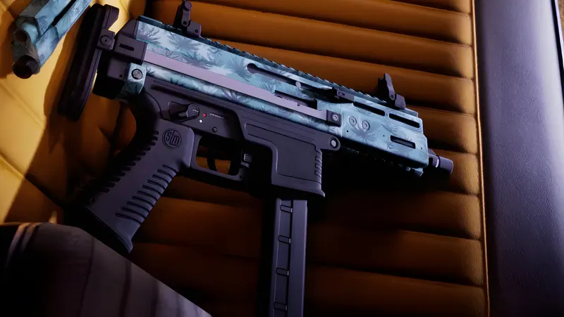 Close-up of a compact submachine gun finished in a blue palm-leaf pattern resting on a car seat, from an official GTA 6 screenshot