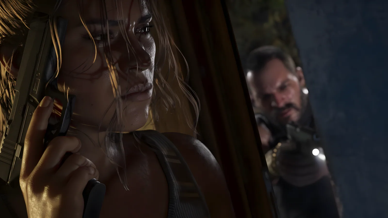 Lucia Caminos holds a pistol close to her face in the dark while an armed man with a weapon light closes in behind her, official GTA 6 screenshot