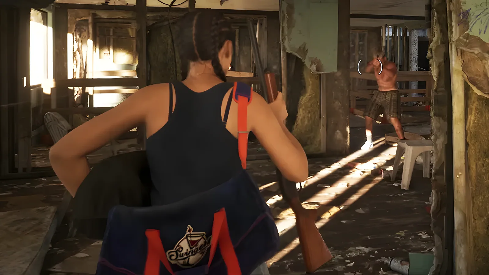 Woman carrying a pump shotgun and a duffel bag inside a run-down building, from the official GTA 6 Extended Look